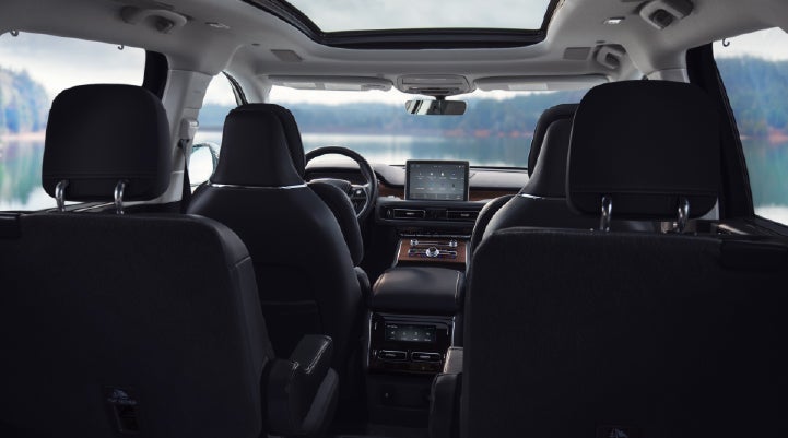 The interior of a 2024 Lincoln Aviator® SUV from behind the second row | Parks Lincoln of Tampa in Tampa FL