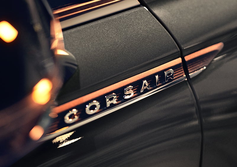 The stylish chrome badge reading “CORSAIR” is shown on the exterior of the vehicle. | Parks Lincoln of Tampa in Tampa FL